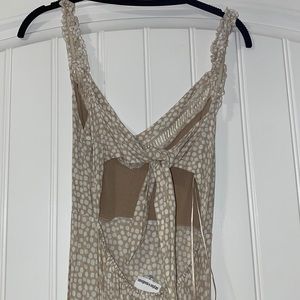 MIDI polka dotted dress with tie back